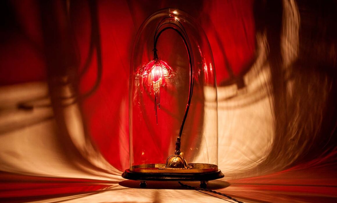 Red fuchsia style Triffid table lamp by Emerald Faerie.