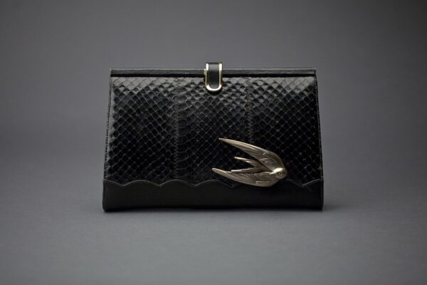 The Swift Clutch by Emerald Faerie. Recycled vintage handbags with solid bronze motif.