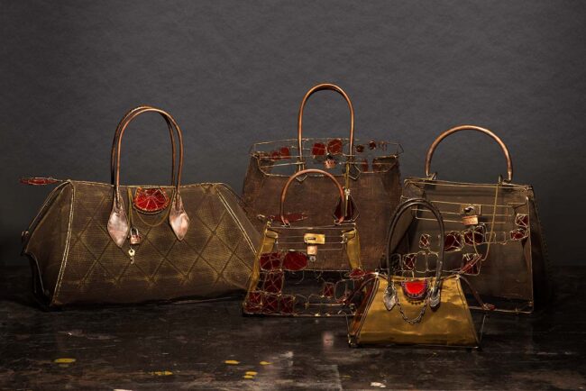 Life size wire and glass replicas of the most iconic Hermès handbags.