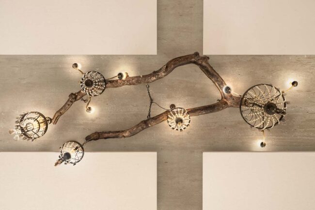 Ambrosia Branch installation with chandeliers hanging from it.